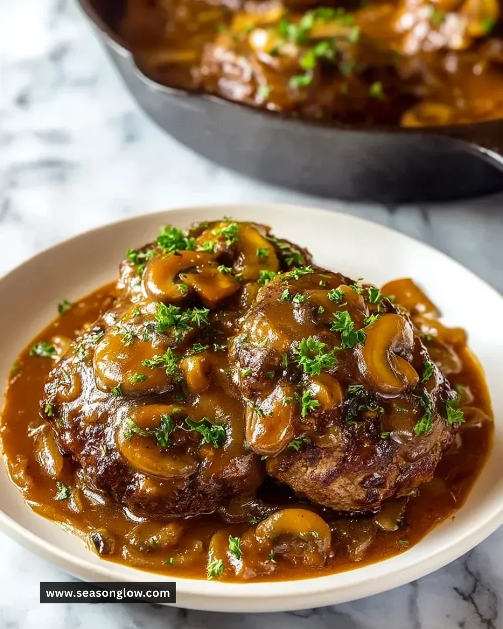 Delicious homemade Salisbury steak with rich gravy and sides