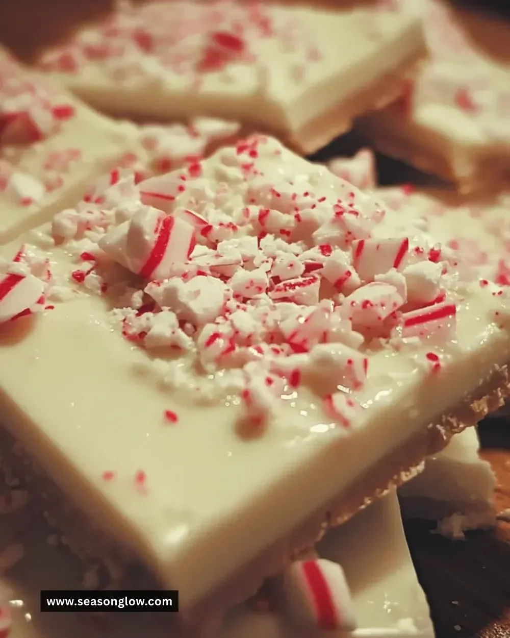 Delicious homemade Christmas peppermint bark on a white plate.