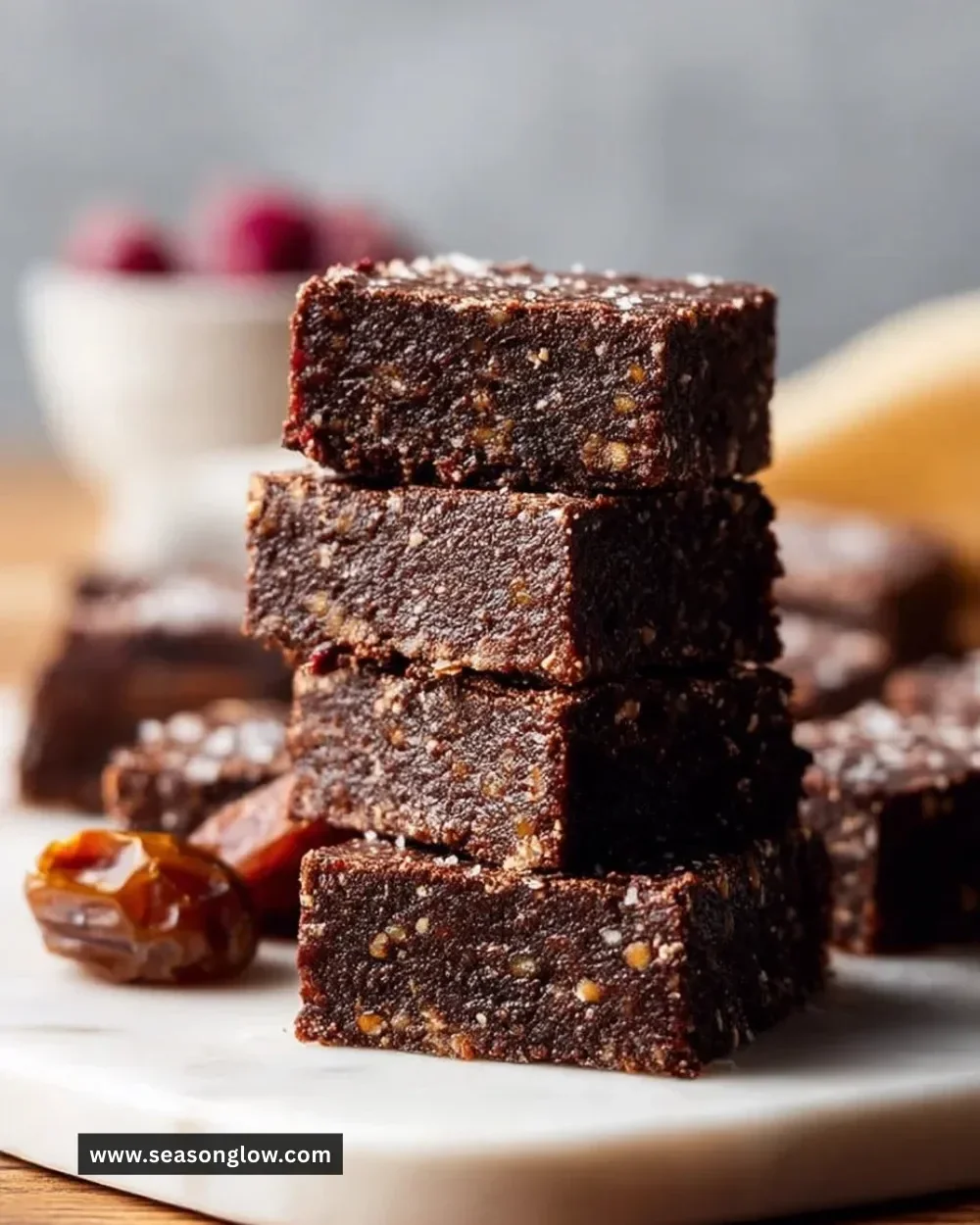 Delicious no bake vegan date brownies on a wooden table
