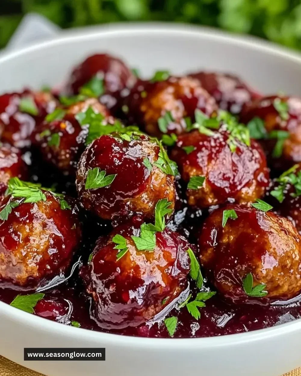 Quick and easy cranberry meatballs served on a platter for a delicious appetizer.