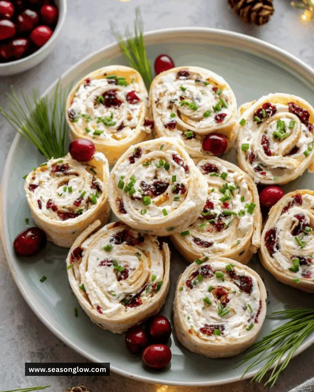 Savory Christmas Cranberry Roll Ups with festive ingredients for holiday parties