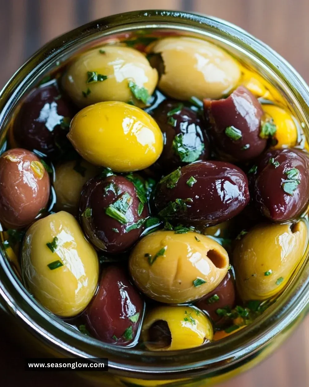 Bowl of simply delicious marinated olives with herbs and spices