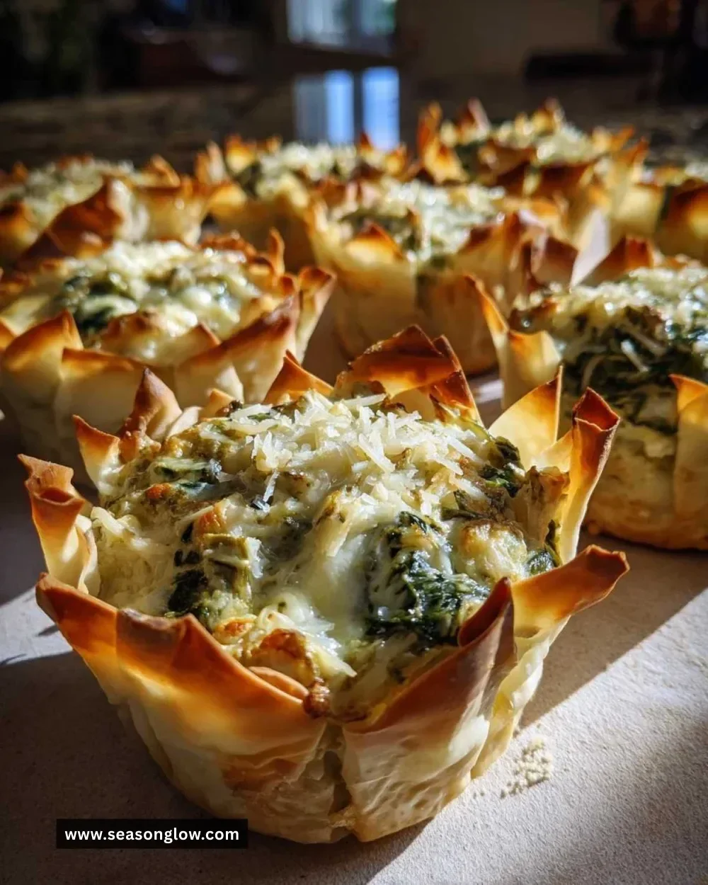 Delicious Spinach Artichoke Bites served on a platter