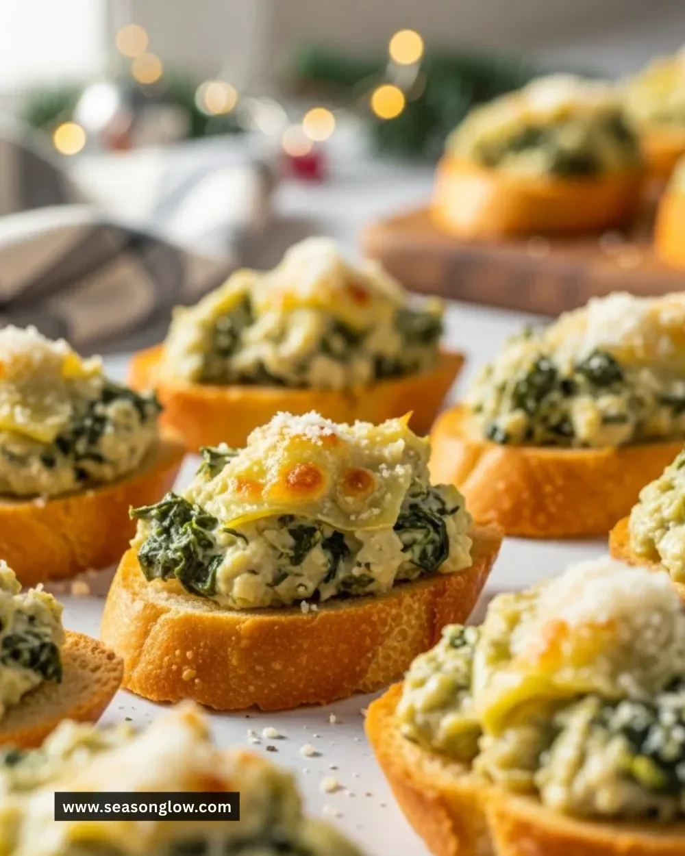 Delicious spinach artichoke crostini served on a rustic platter.