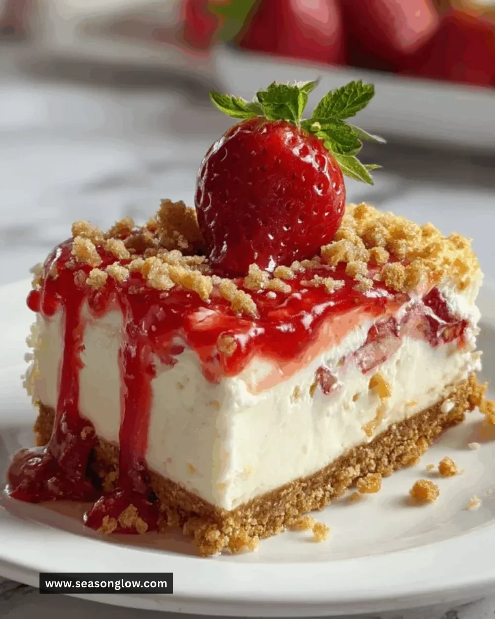 Delicious Strawberry Crunch Cheesecake with vibrant strawberry topping