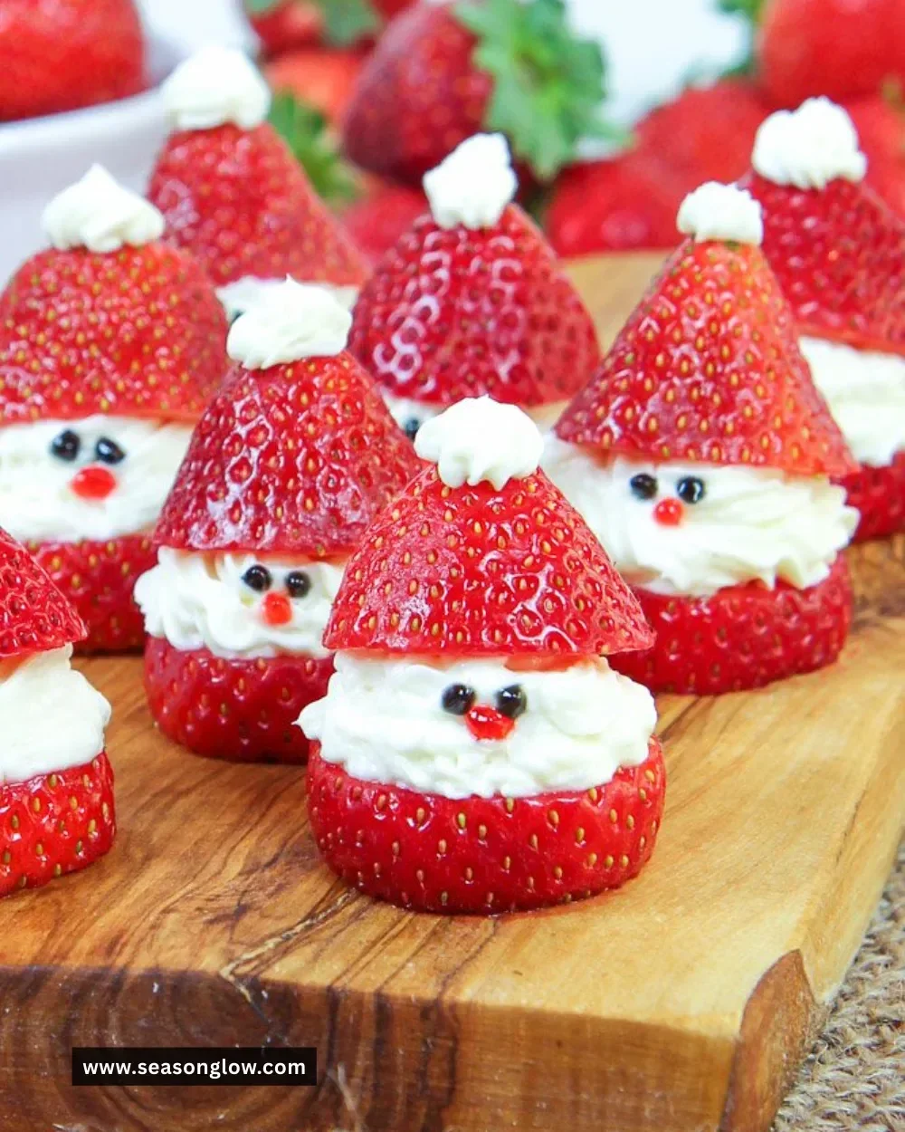 Festively arranged Strawberry Santas decorated for a holiday celebration