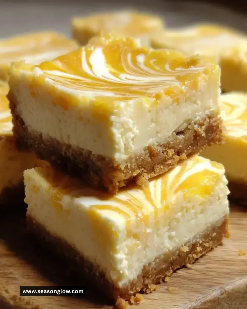 Swirled lemon cheesecake bars with creamy texture and lemony swirls