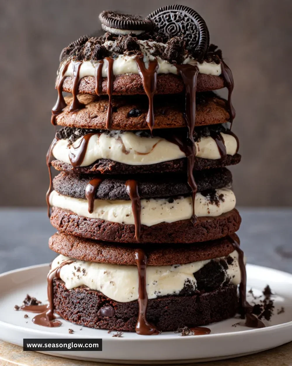 Ultimate Oreo cookie brownie stack cake with layers of brownies and Oreos