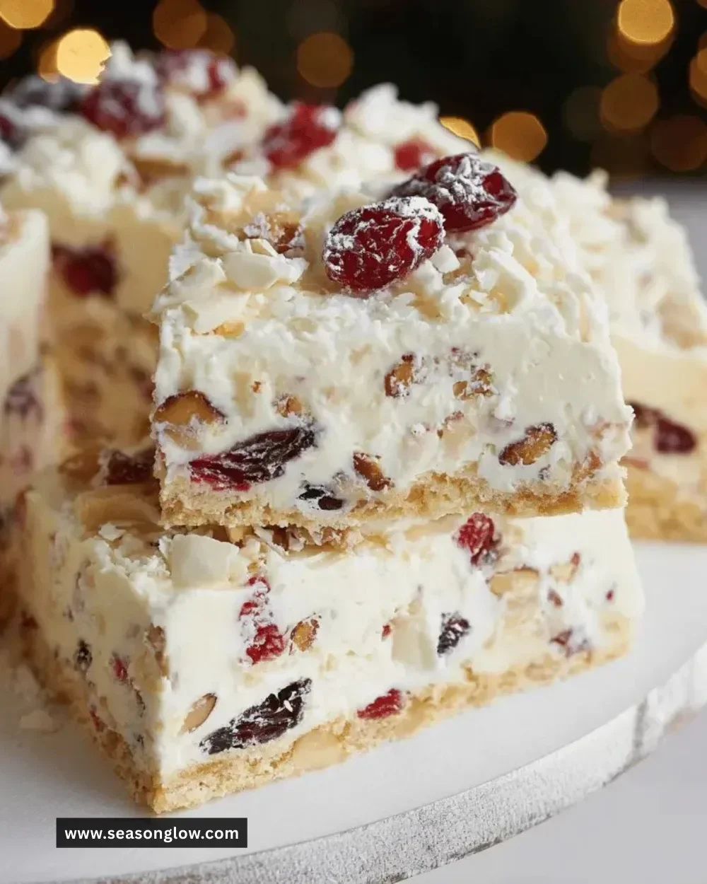 Delicious homemade White Christmas Slice on a festive plate.