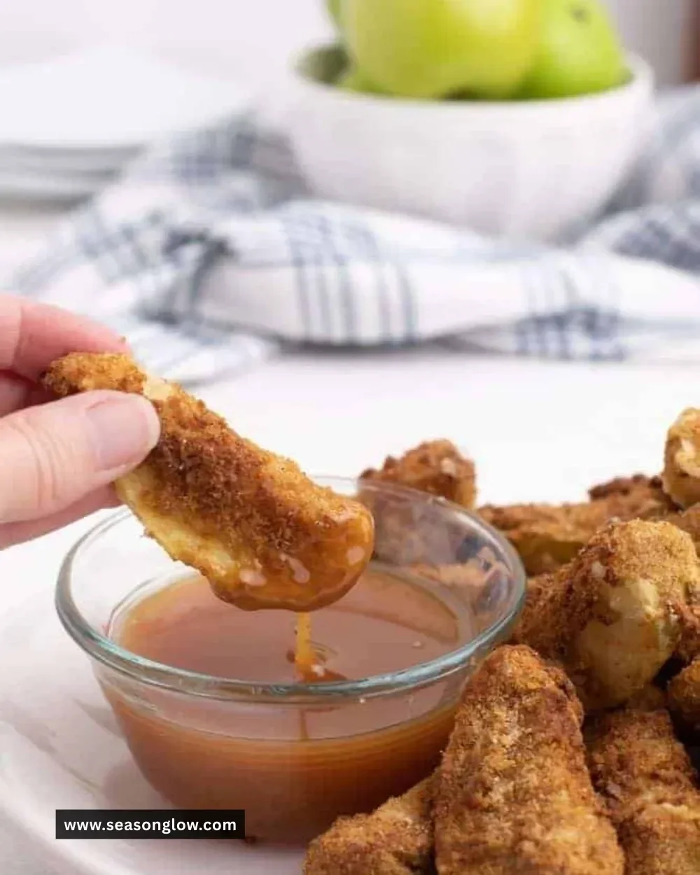 Crispy air fryer apple slices ready to enjoy as a healthy snack.
