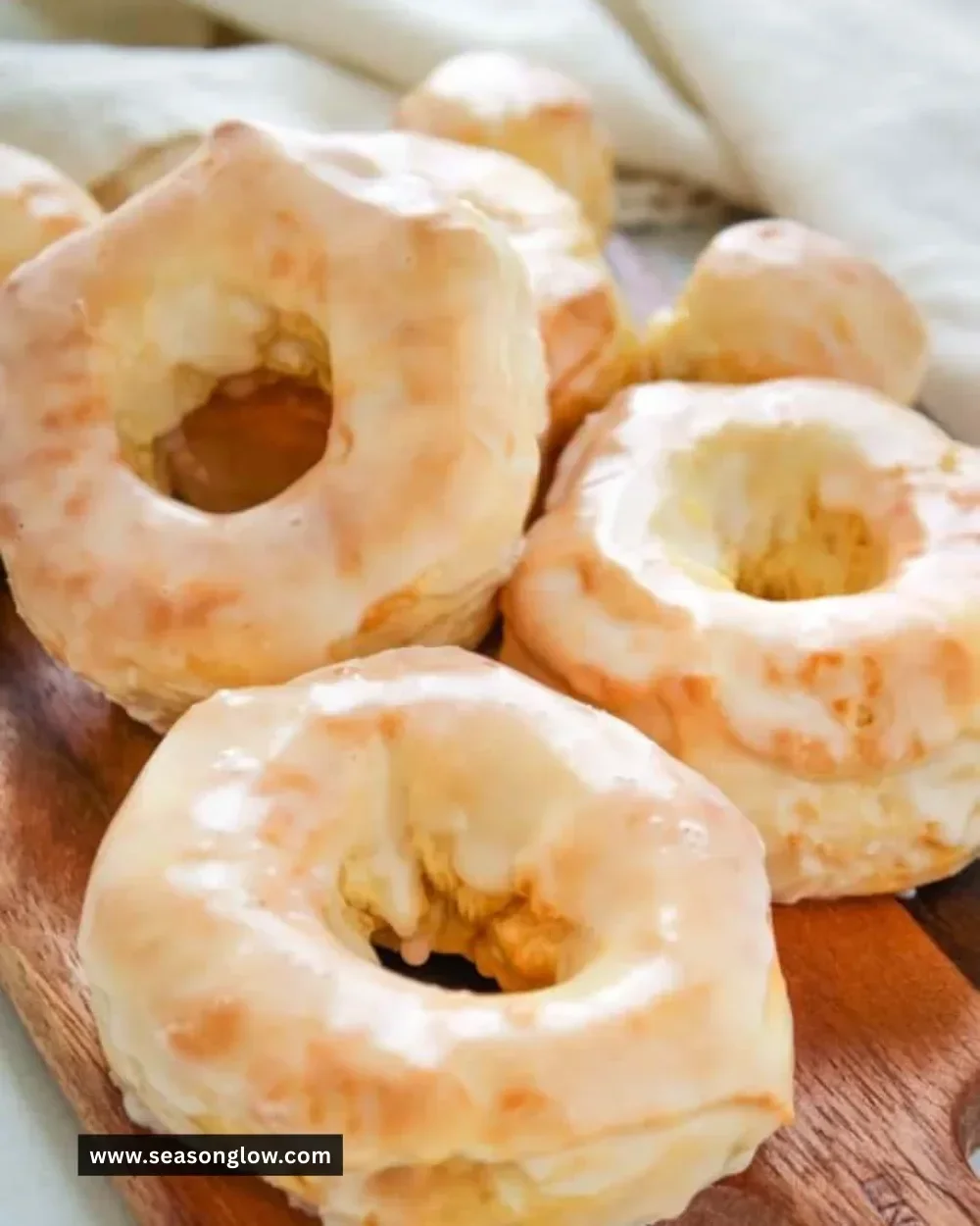 Homemade air fryer donuts with colorful icing on a plate
