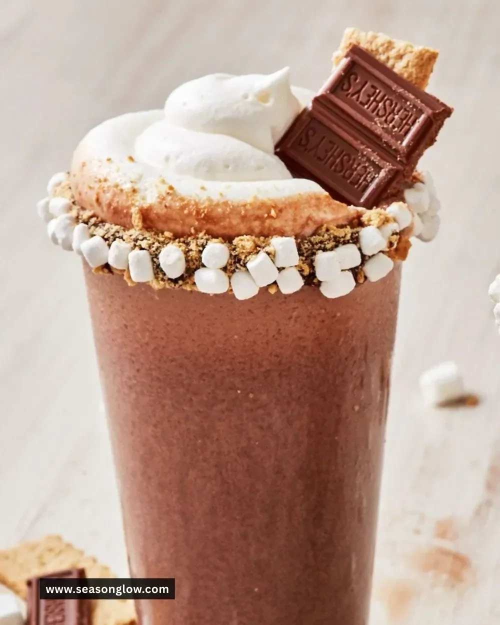 Boozy S'mores Milkshake topped with marshmallows and chocolate