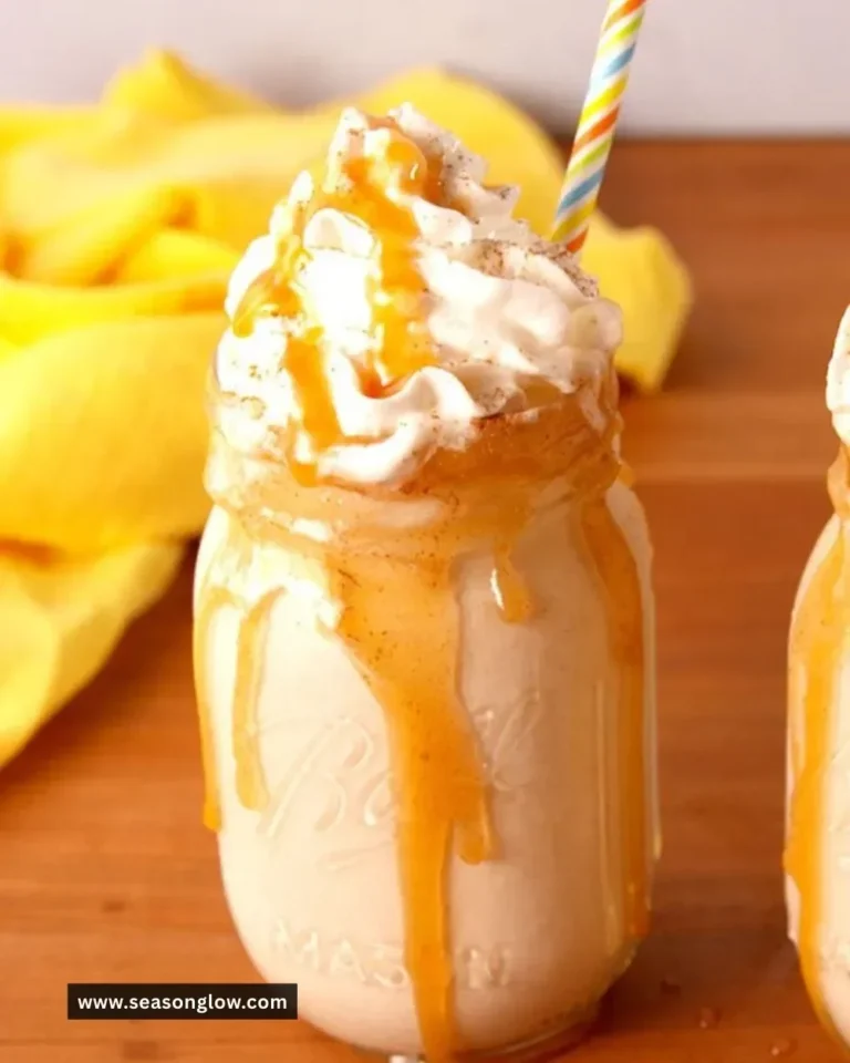 Delicious Bourbon Milk Punch cocktail garnished with nutmeg