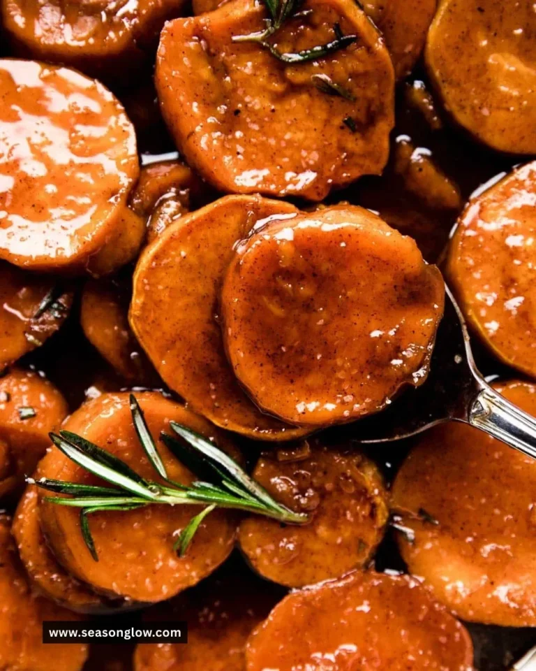 Delicious candied sweet potatoes with a sweet glaze served in a bowl.
