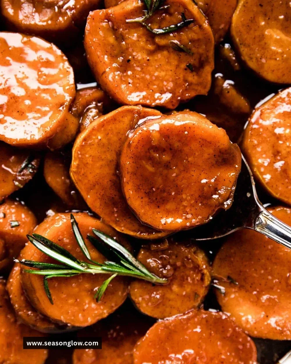 Delicious candied sweet potatoes with a sweet glaze served in a bowl.