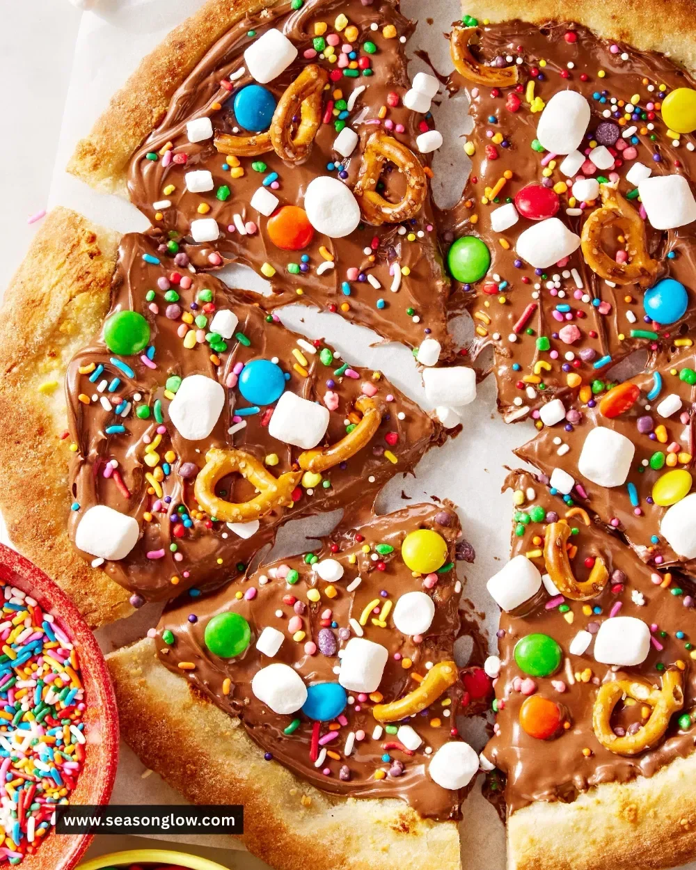 Delectable Chocolate Pizza topped with strawberries and whipped cream