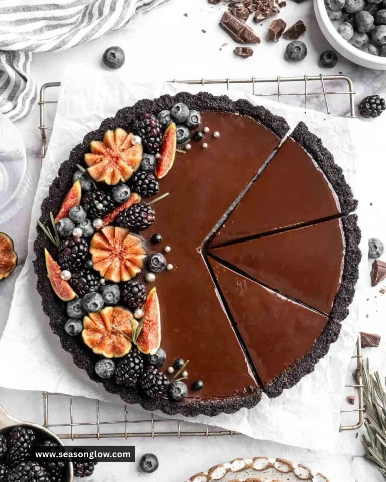 Decadent chocolate tart with a glossy finish and rich filling