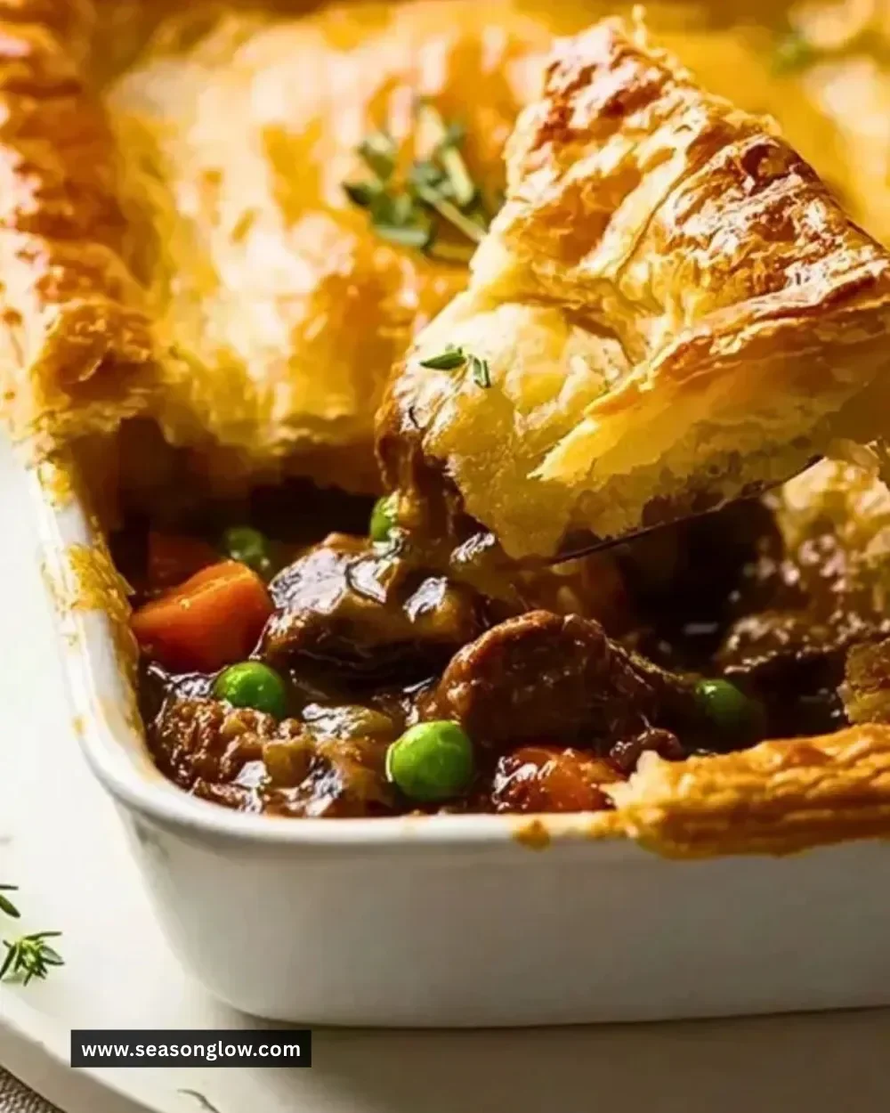 Delicious Classic Beef Pot Pie with flaky crust and tender beef filling.