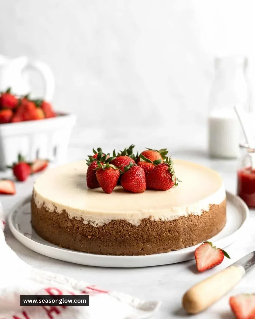 Classic New York Cheesecake slice with a buttery graham cracker crust