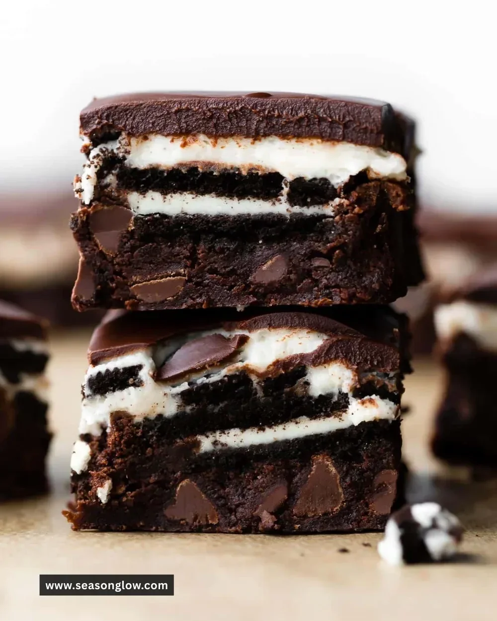 Delicious Cookies & Cream Brownies topped with crushed cookies and creamy frosting.