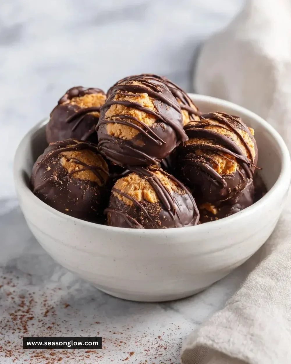 Crunchy Chocolate Peanut Butter Bites with a rich chocolate coating and creamy peanut butter filling.