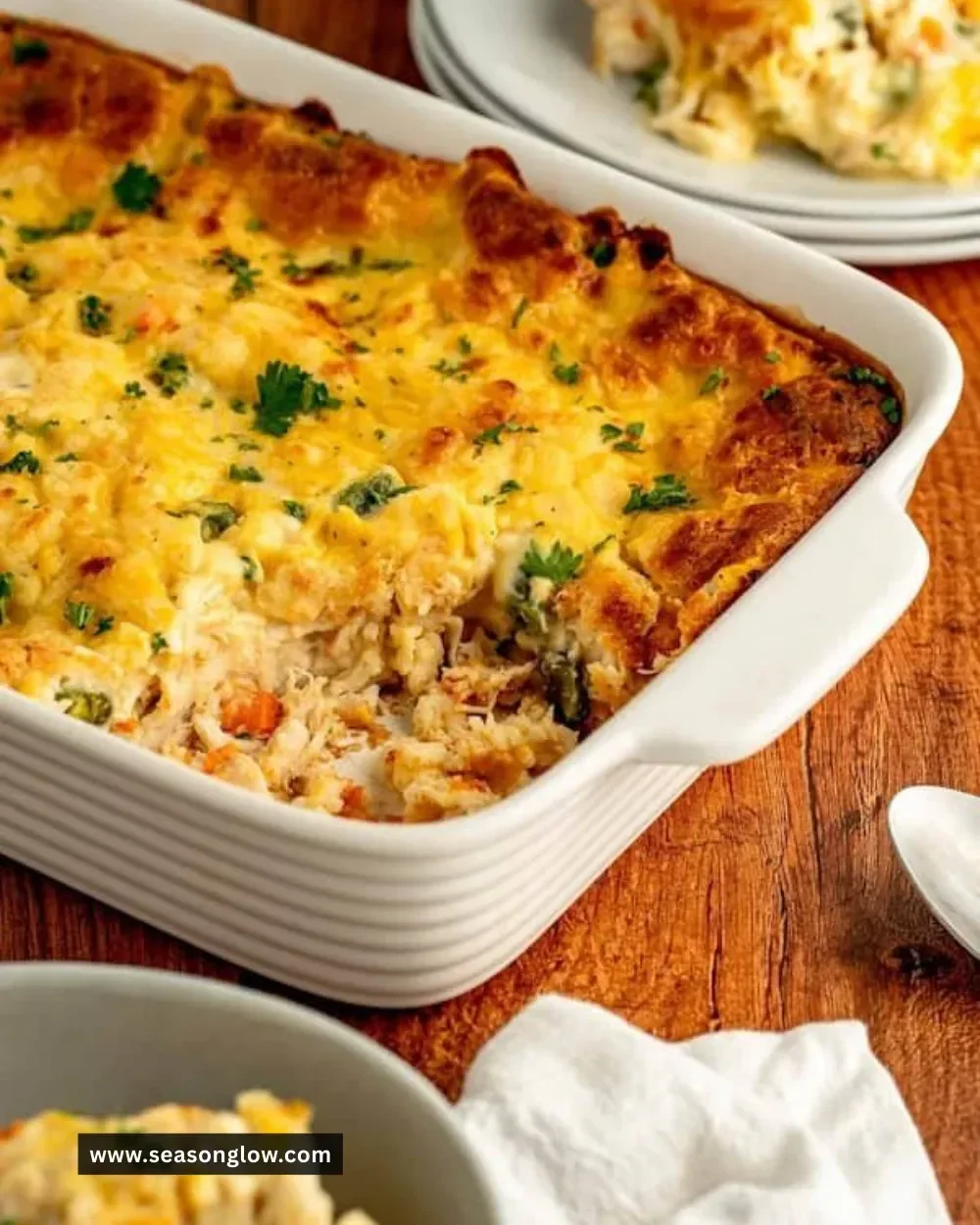 Delicious easy chicken cobbler topped with flaky biscuits