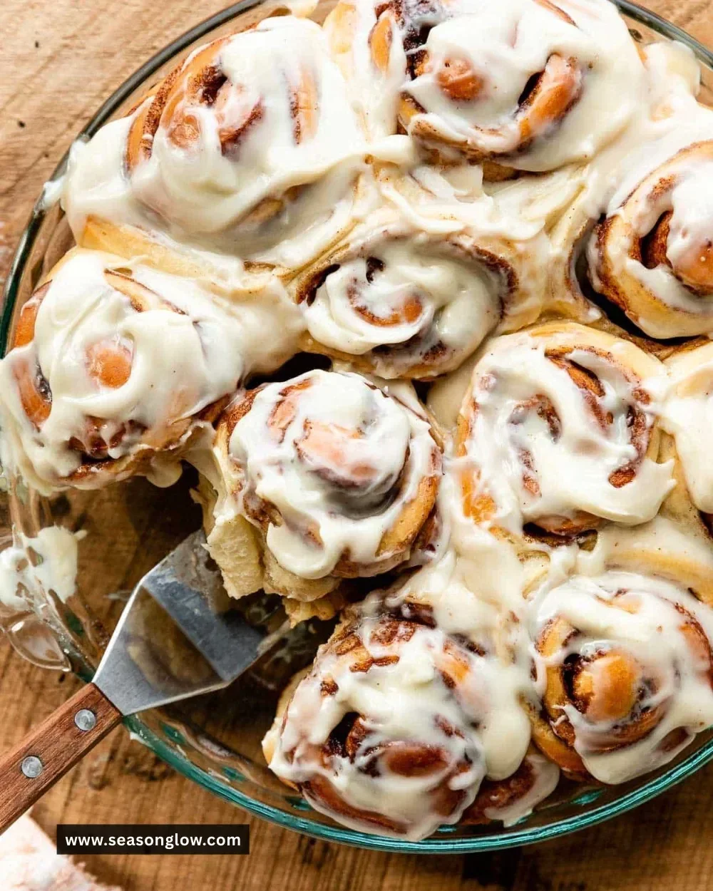 Freshly baked easy cinnamon rolls from scratch on a cooling rack