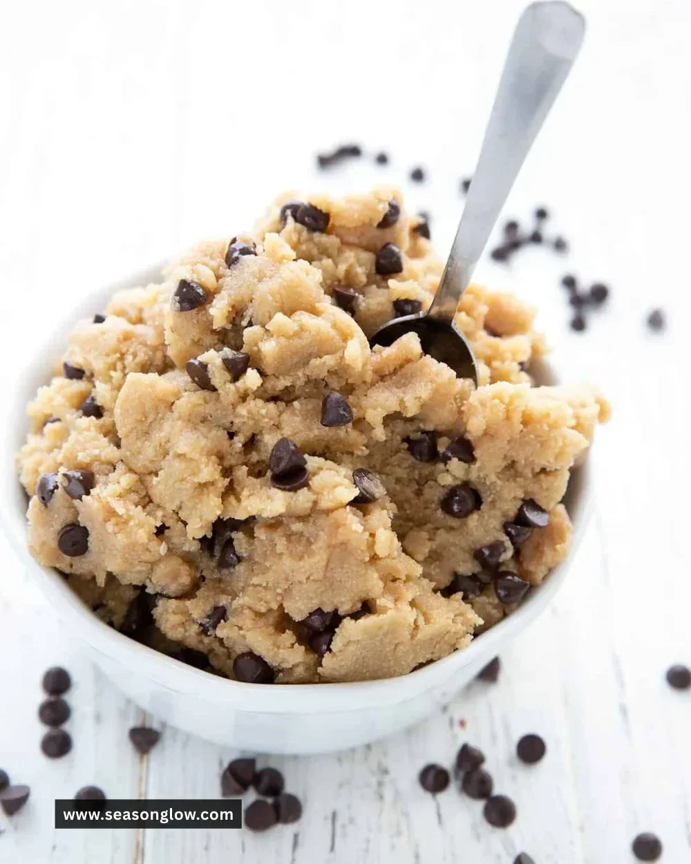 Delicious easy keto cookie dough in a bowl with chocolate chips.