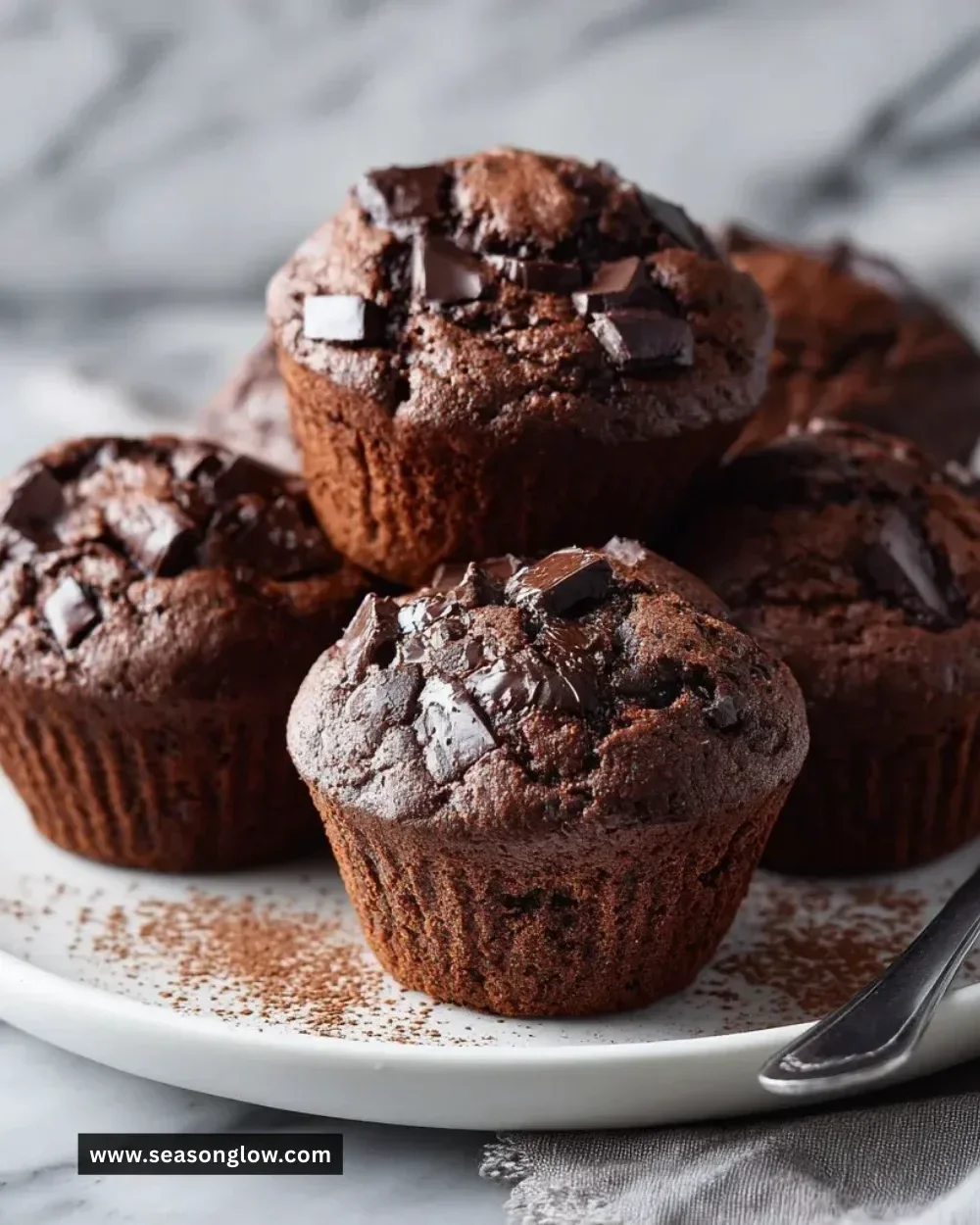 Freshly baked espresso double chocolate muffins topped with chocolate chips