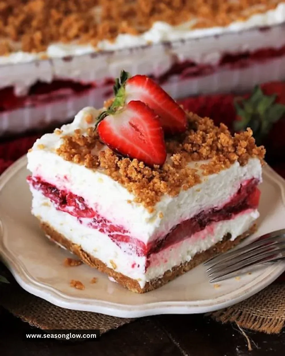 Delicious fresh strawberry yum yum dessert with whipped cream and mint garnish