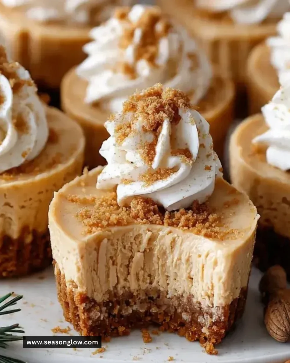 Gingerbread cheesecake cups topped with festive decorations