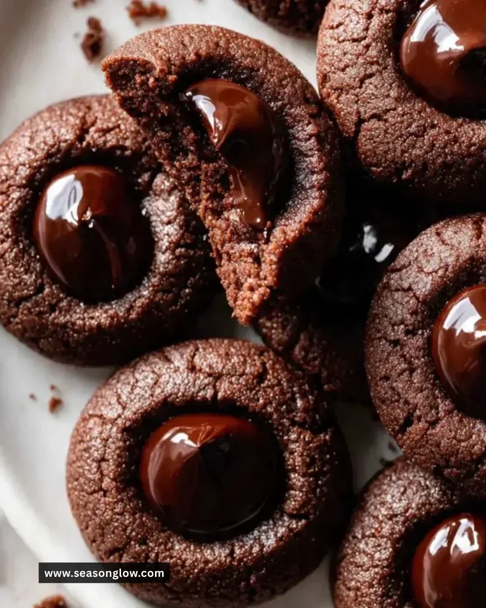 Gluten-free chocolate thumbprint Christmas cookies filled with chocolate ganache