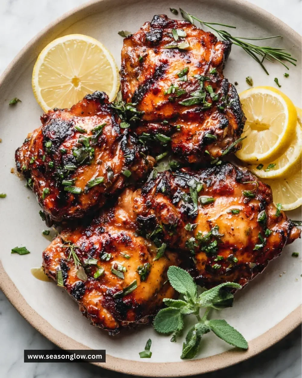 Delicious grilled chicken thighs served with fresh herbs and spices.
