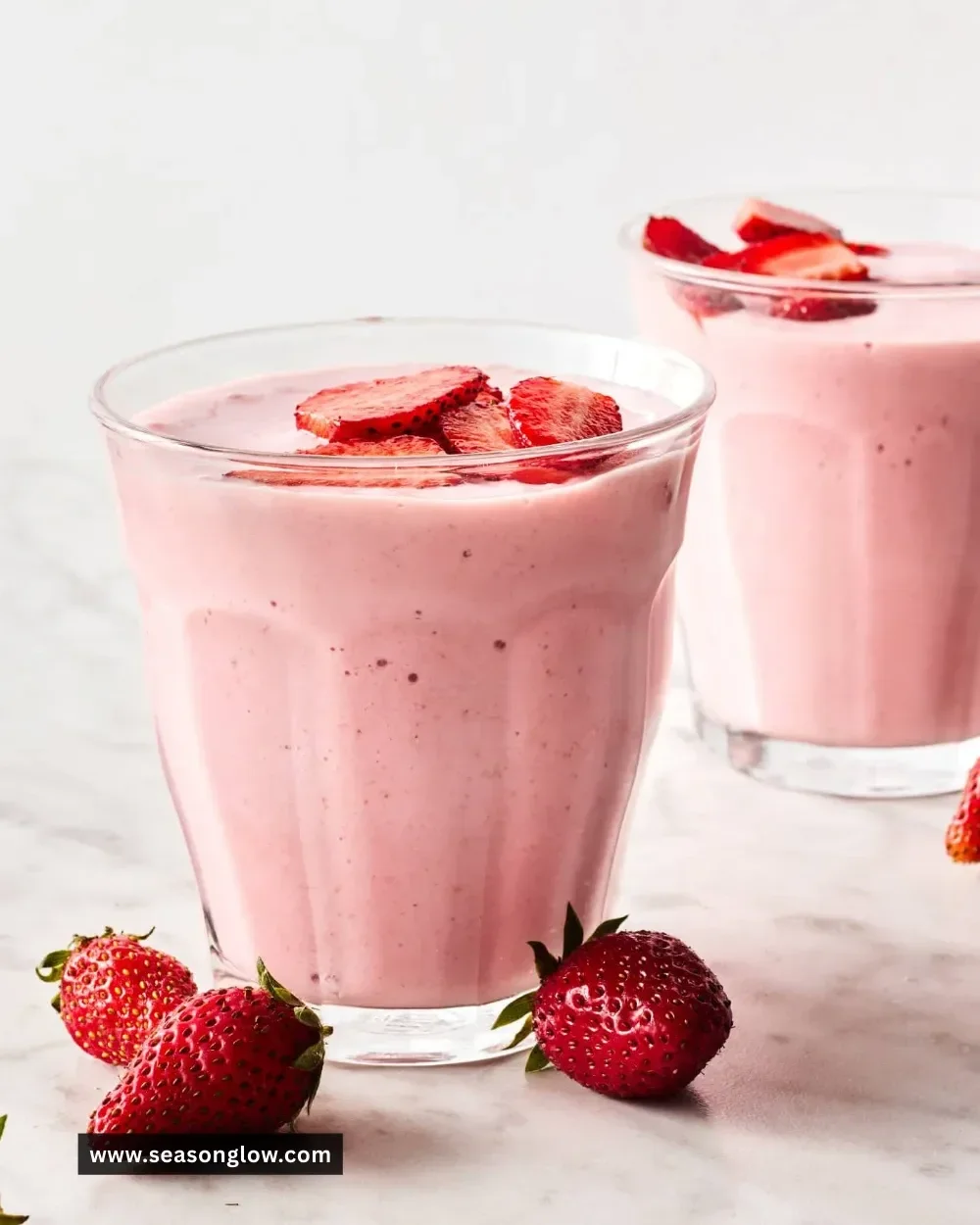 Variety of healthy breakfast smoothies in colorful glass jars