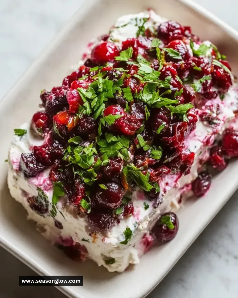 Holiday Cranberry Jalapeño Cream Cheese Dip served with crackers