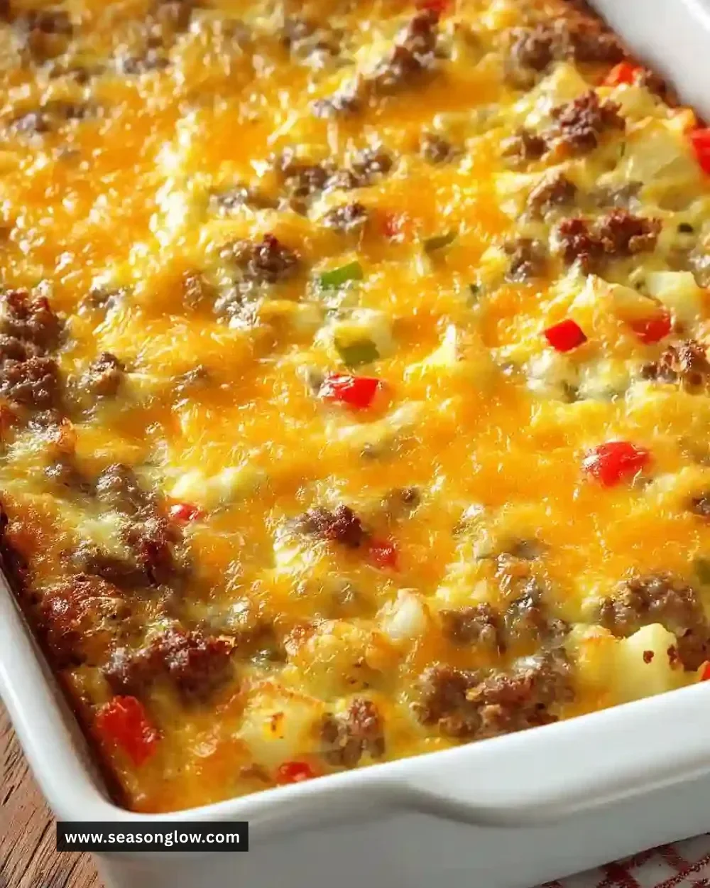 Delicious homemade breakfast casserole with eggs, cheese, and vegetables.