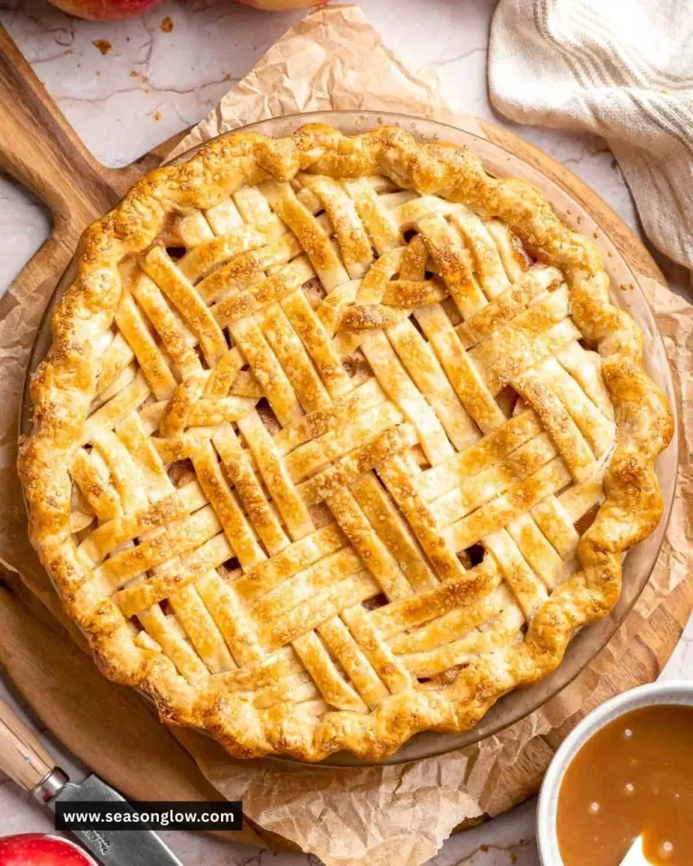 Delicious homemade caramel apple pie with a flaky crust and rich caramel drizzle.
