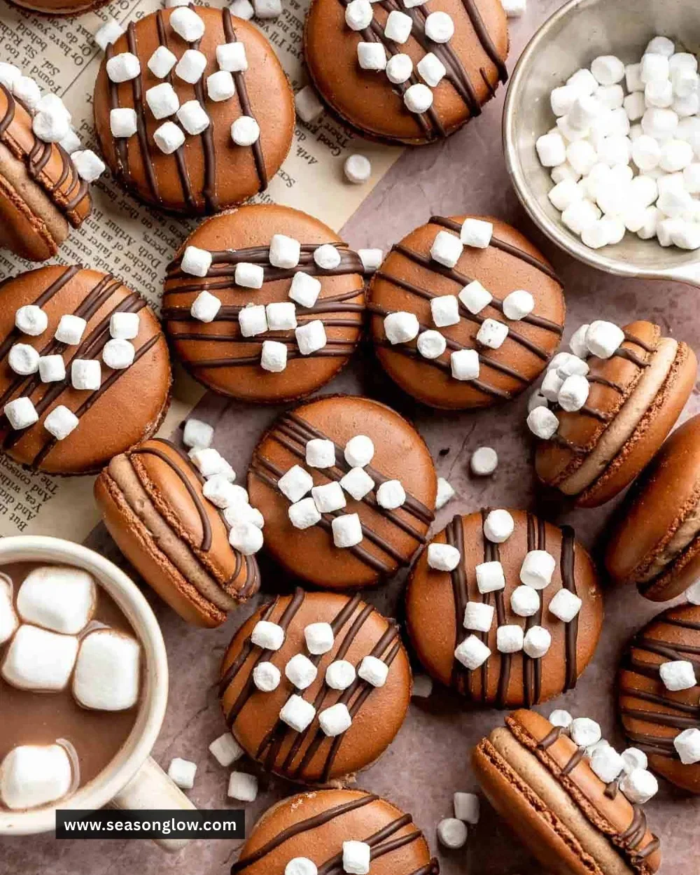 Delicious hot chocolate macarons with a rich chocolate filling and delicate shells.