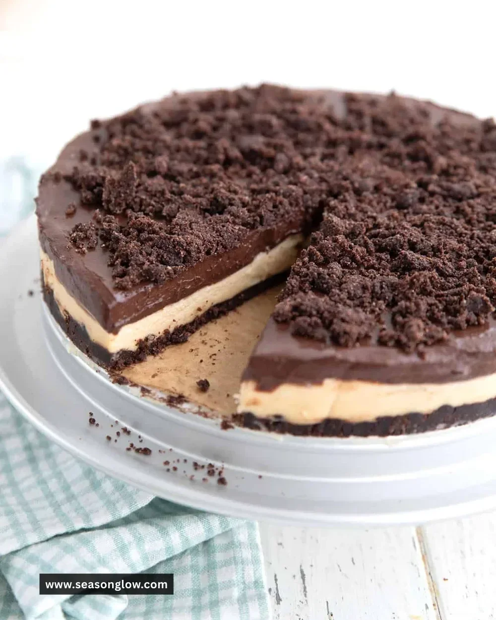 Delicious Keto Peanut Butter Dirt Cake topped with chocolate and peanut butter