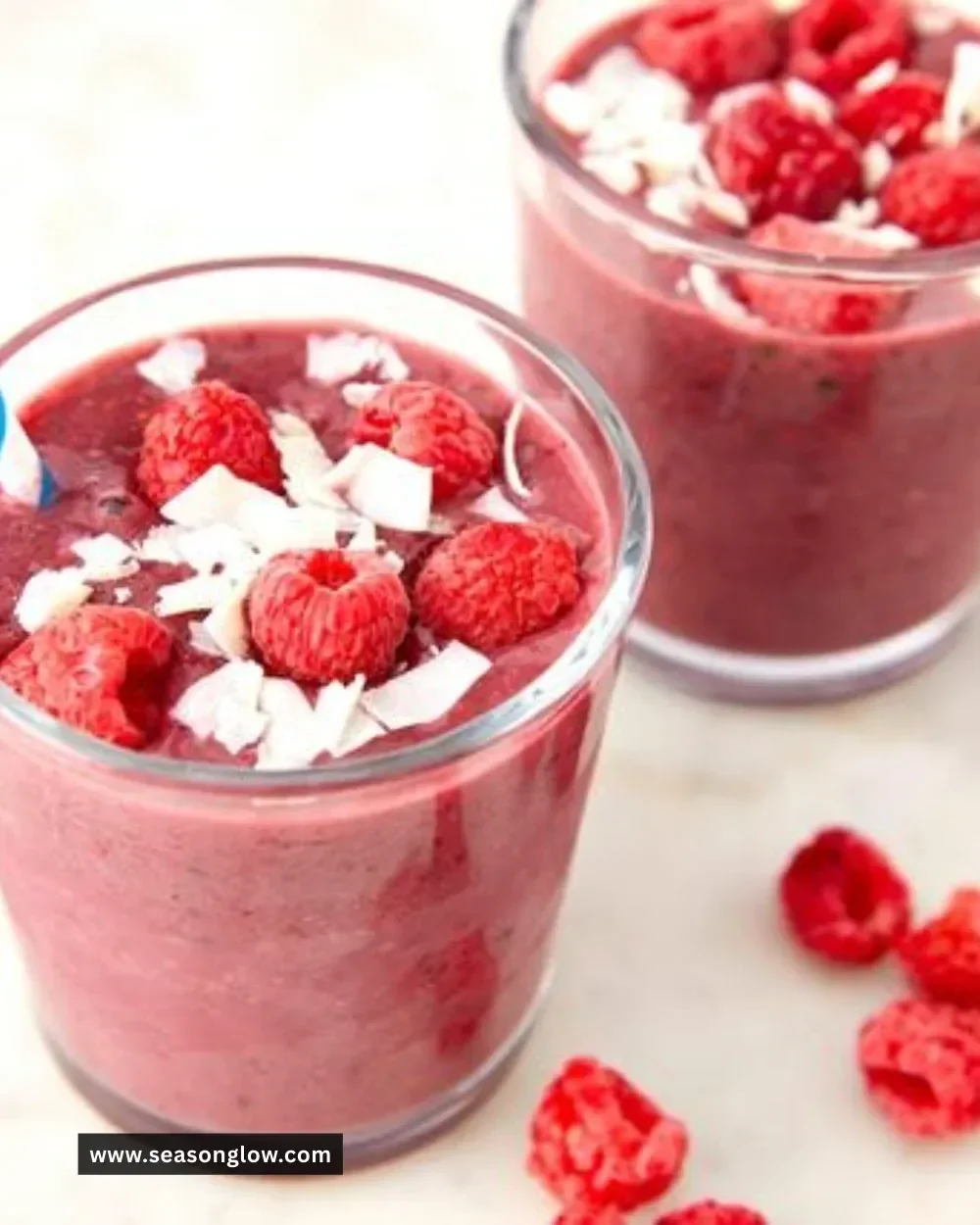 Delicious keto smoothie in a glass with berries and spinach