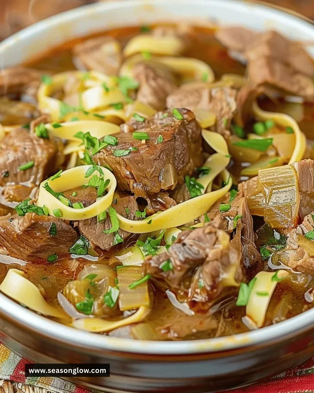 Bowl of hearty Mississippi pot roast soup with vegetables and herbs