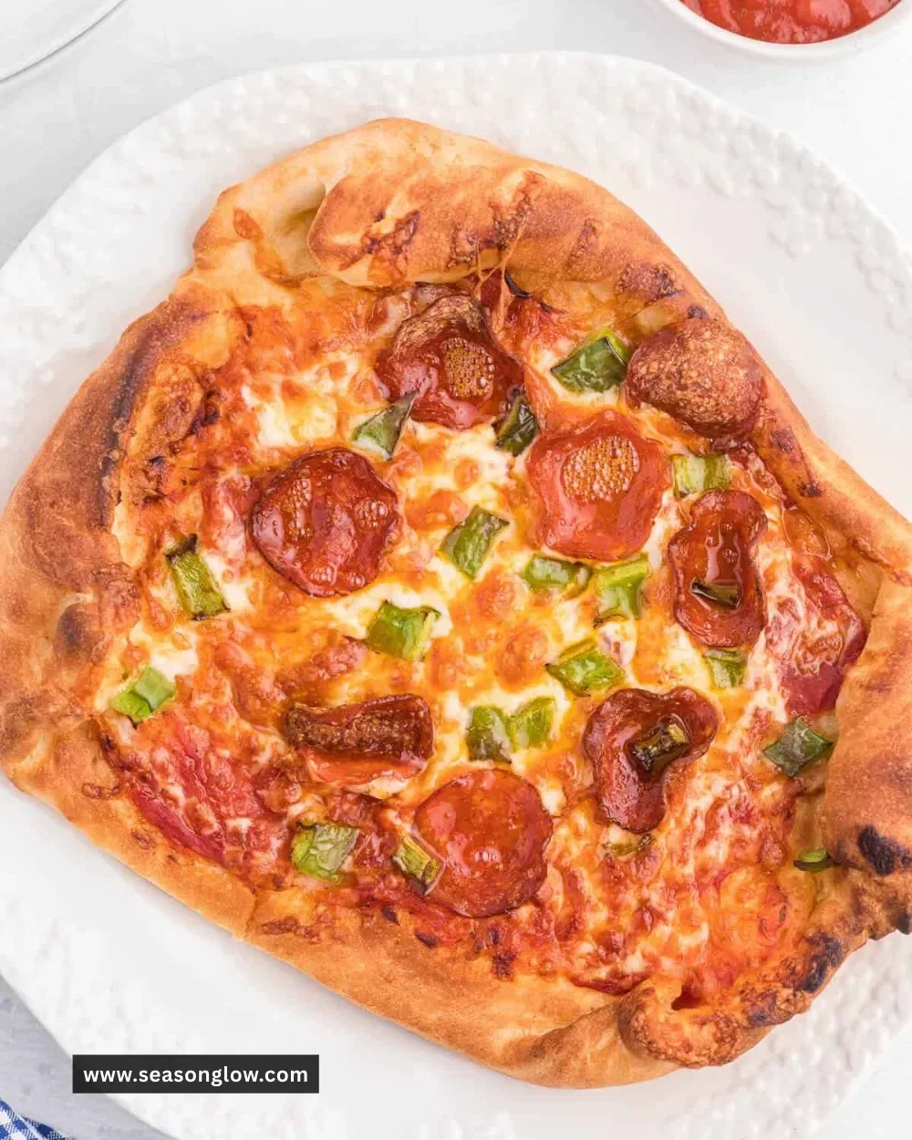 Homemade Ninja Air Fryer Pizza served with fresh toppings