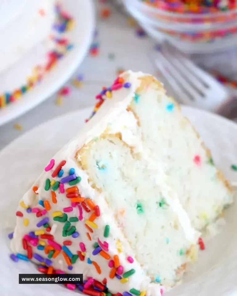 Ninja Foodi Confetti Cake decorated with colorful sprinkles and icing