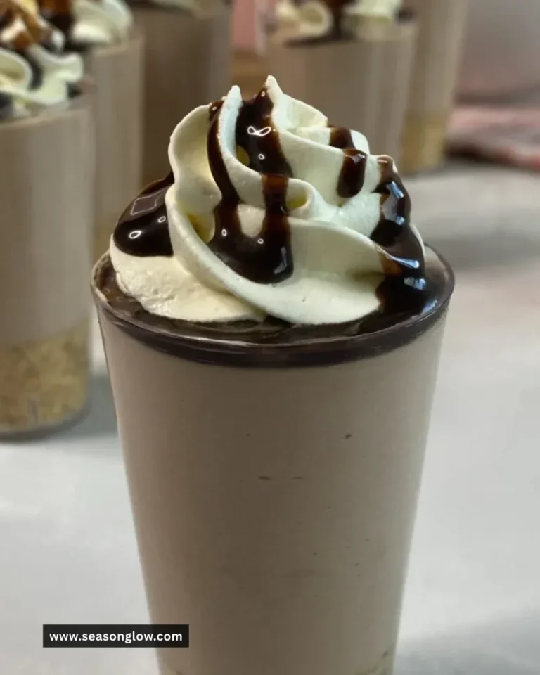 No-Bake Chocolate Milkshake Cheesecake Cups topped with chocolate drizzles