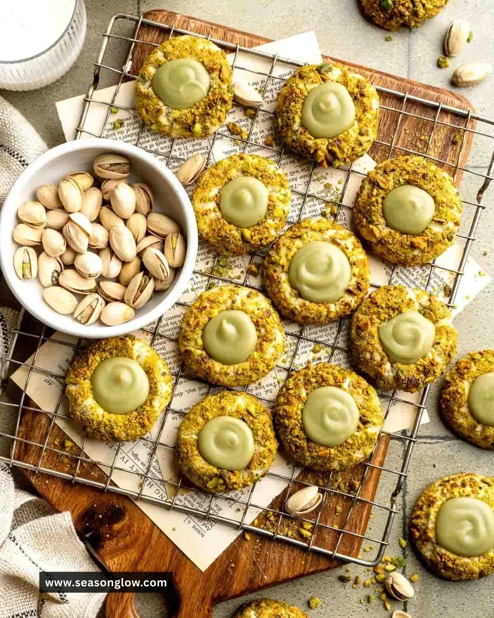 Delicious pistachio thumbprint cookies on a vibrant plate