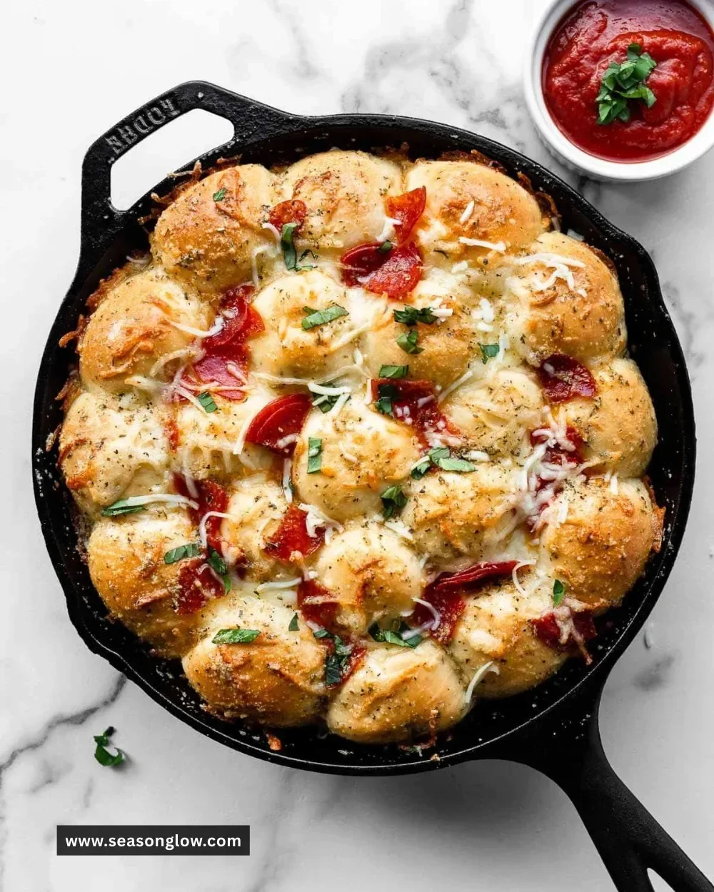 Delicious Pizza Pull Apart Rolls topped with cheese and pepperoni
