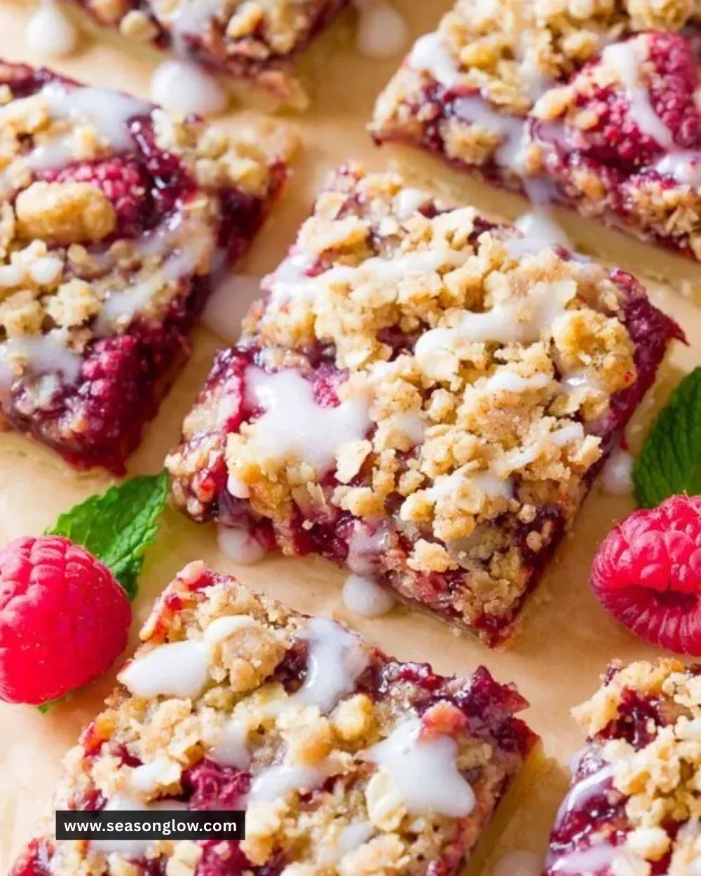 Freshly baked Raspberry Streusel Bars on a white plate