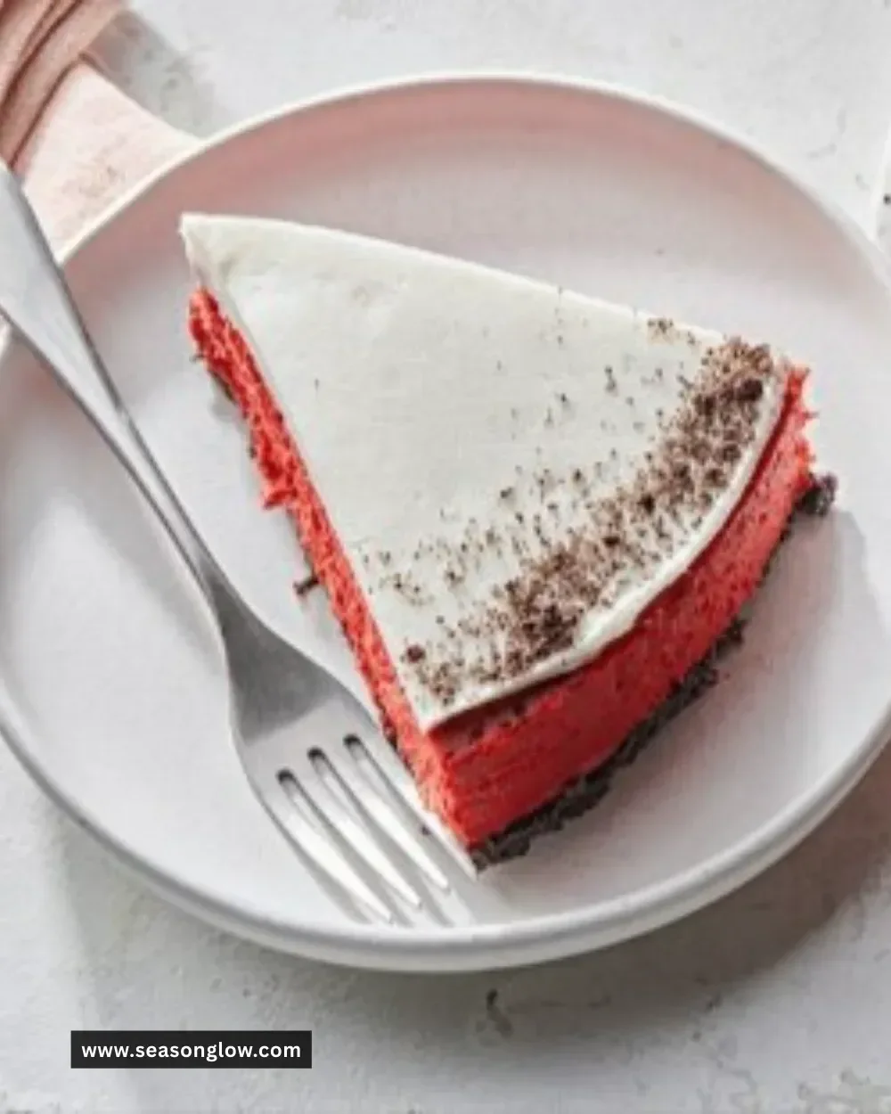 Red Velvet Christmas Cheesecake decorated with festive toppings