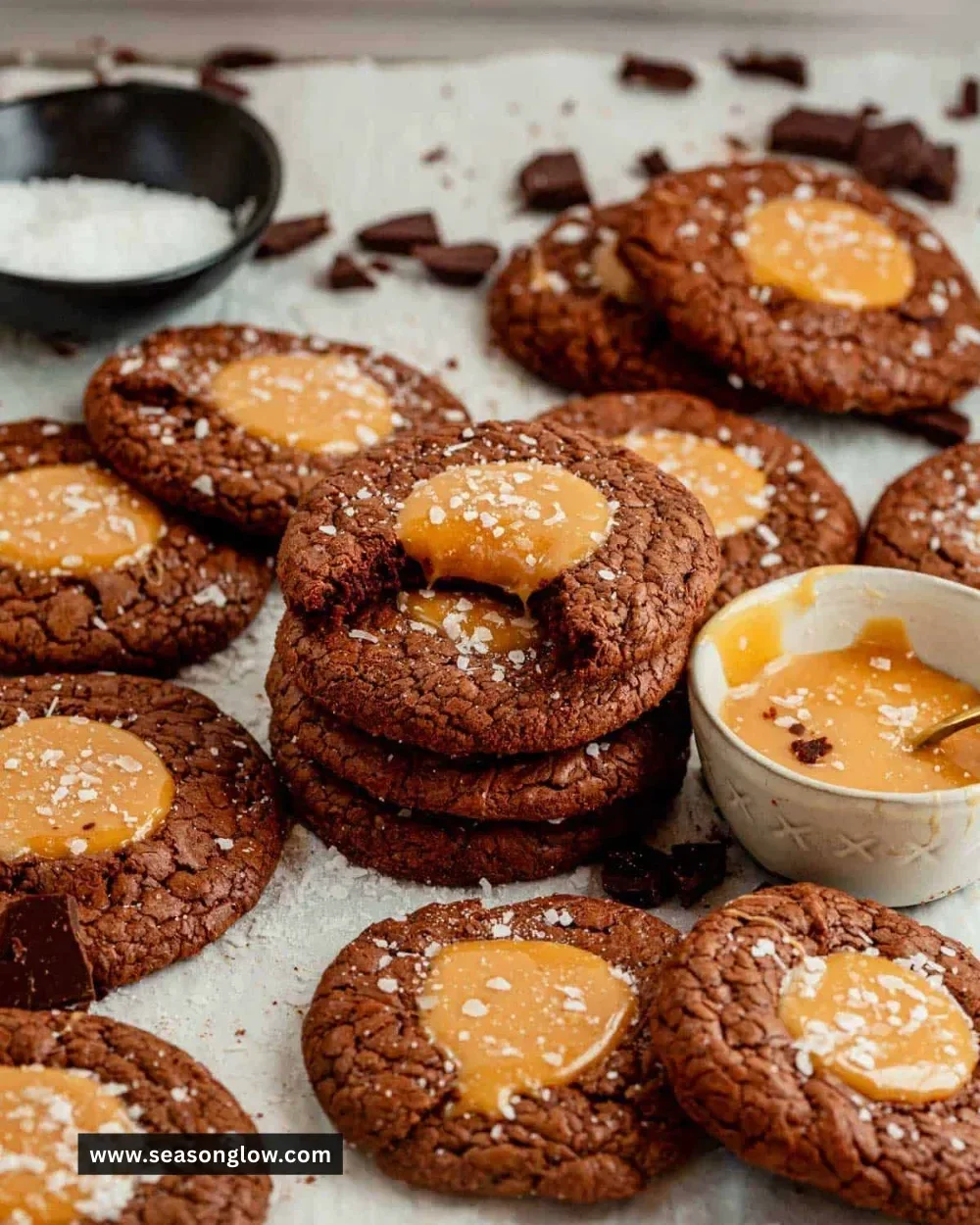 Delicious salted caramel brownie cookies on a cooling rack.