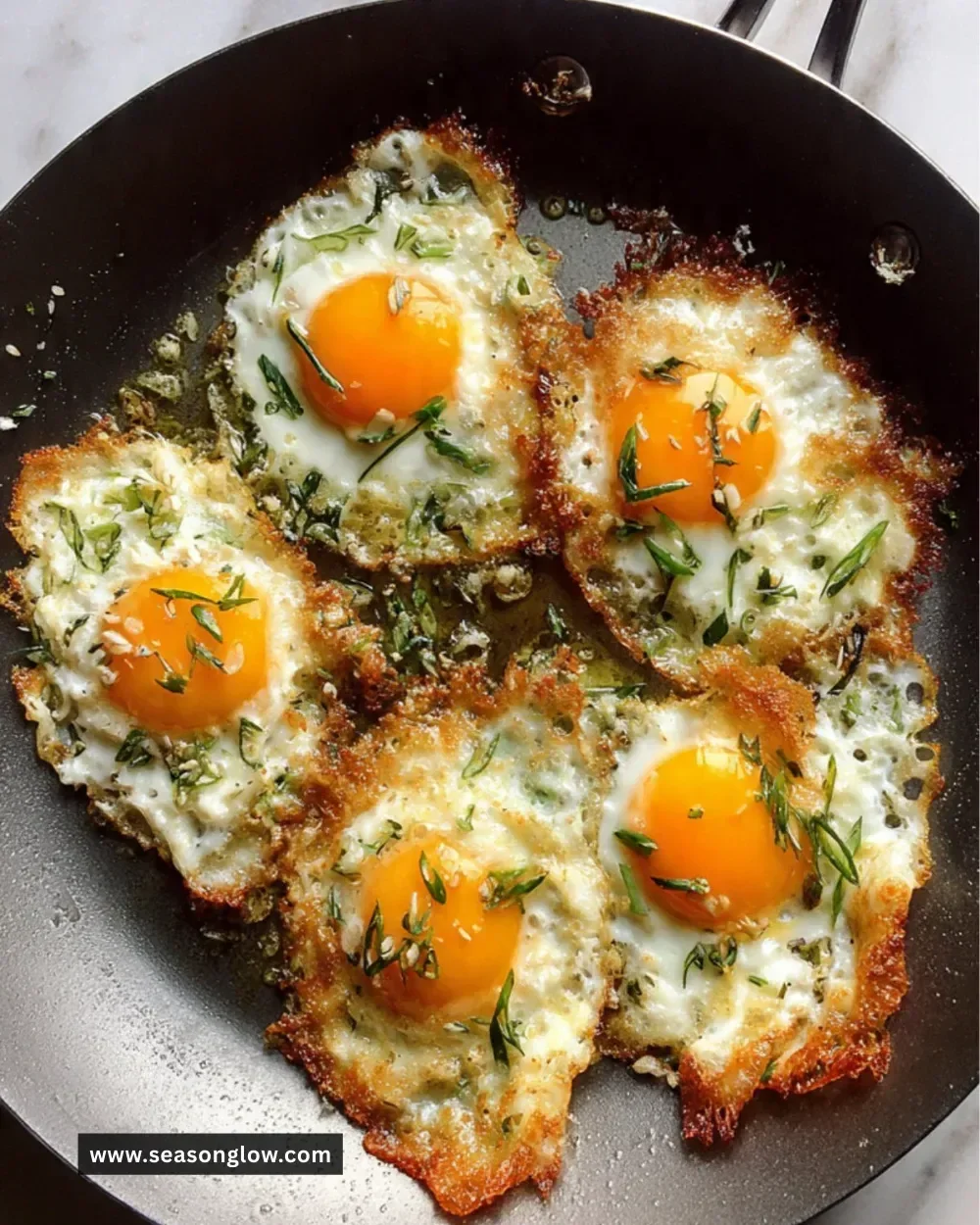 Plate of scallion fried eggs garnished with green onions